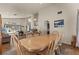 Elegant dining area featuring travertine tile floors and a large table, perfect for entertaining guests and Gathering gatherings at 2024 Spruce Brook Dr, Henderson, NV 89074