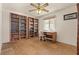 Inviting home office featuring built-in bookshelves, a window for natural light and a desk, perfect for work and study at 2024 Spruce Brook Dr, Henderson, NV 89074