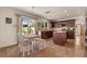 Bright kitchen with stainless steel appliances, granite countertops, and an island, perfect for cooking and entertaining at 2024 Spruce Brook Dr, Henderson, NV 89074