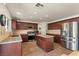 Modern kitchen with stainless steel appliances, granite countertops, and custom cabinetry, ideal for cooking and entertaining guests at 2024 Spruce Brook Dr, Henderson, NV 89074