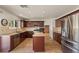 Spacious kitchen featuring stainless steel appliances, granite countertops, and a central island at 2024 Spruce Brook Dr, Henderson, NV 89074