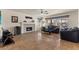 Cozy living room features tile floors, a fireplace, and comfortable seating at 2024 Spruce Brook Dr, Henderson, NV 89074