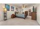 Spacious main bedroom suite with a ceiling fan, side tables, and a cozy ambiance for relaxation and comfort at 2024 Spruce Brook Dr, Henderson, NV 89074