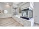 Bathroom suite with tub, marble fireplace, vanity and shower with matching tile at 217 Windsong Dr, Henderson, NV 89074