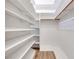 Large walk-in closet with built-in shelving, offering plenty of storage and organization options at 217 Windsong Dr, Henderson, NV 89074