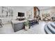 Stylish open-concept living area with an eat-in kitchen, tile floors, and ample natural light at 217 Windsong Dr, Henderson, NV 89074