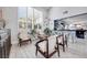 Bright living room features stylish seating, tile floors, and plantation shutters at 217 Windsong Dr, Henderson, NV 89074