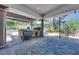 A luxury outdoor kitchen, complete with a grill and spiral staircase, perfect for upscale entertaining at 217 Windsong Dr, Henderson, NV 89074