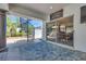 A beautifully designed patio features a spiral staircase and access to the home's dining area at 217 Windsong Dr, Henderson, NV 89074