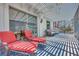Inviting patio with lounge chairs, perfect for relaxation and outdoor enjoyment, with shaded pergola and sun protection at 217 Windsong Dr, Henderson, NV 89074