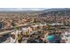 An aerial view of a community with a pool, covered parking, and desert landscaping at 2191 Bay Club Dr # 204, Laughlin, NV 89029
