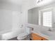 Bright bathroom with tiled shower and tub combination and white vanity at 2191 Bay Club Dr # 204, Laughlin, NV 89029