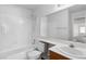 Bright bathroom with shower over bath and light wood vanity at 2191 Bay Club Dr # 204, Laughlin, NV 89029