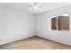 Bedroom with neutral walls, carpet, window and ceiling fan at 2191 Bay Club Dr # 204, Laughlin, NV 89029
