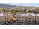 Residential community featuring desert landscaping, tile roofs, balconies, and manicured landscaping at 2191 Bay Club Dr # 204, Laughlin, NV 89029