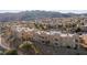 Residential community with desert landscaping, tile roofs, private patios, and distant mountain views at 2191 Bay Club Dr # 204, Laughlin, NV 89029