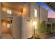 This exterior view displays a unique stucco building with a well-kept landscape at 2191 Bay Club Dr # 204, Laughlin, NV 89029