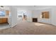 Spacious living area showcasing a cozy fireplace and access to the balcony at 2191 Bay Club Dr # 204, Laughlin, NV 89029