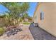 Long backyard with storage shed, landscaped yard, and pavers at 2268 Alanhurst Dr, Henderson, NV 89052