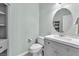 Powder room featuring modern fixtures, vanity, and neutral color palette at 2268 Alanhurst Dr, Henderson, NV 89052
