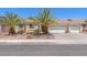 Charming single-story home featuring desert landscaping and a three-car garage at 2268 Alanhurst Dr, Henderson, NV 89052