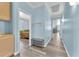 Hallway featuring luxury vinyl plank flooring and bright, neutral paint colors at 2268 Alanhurst Dr, Henderson, NV 89052
