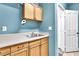 Laundry room with sink, storage, and natural light at 2268 Alanhurst Dr, Henderson, NV 89052
