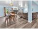 Combination living and dining area featuring comfortable seating, a table with chairs, and backyard access at 2268 Alanhurst Dr, Henderson, NV 89052