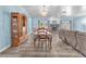 Open floor plan showcasing the living room, dining area, and fireplace in a cozy setting at 2268 Alanhurst Dr, Henderson, NV 89052