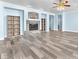 An open living room shows natural light and modern wood flooring at 2268 Alanhurst Dr, Henderson, NV 89052