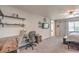 Bedroom featuring a desk area, carpet flooring, and a ceiling fan, offering a versatile and comfortable living space at 2293 Sky Island Dr, Henderson, NV 89002