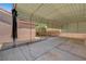 Wide carport providing plenty of covered parking with a view of the backyard shed at 2398 S Lamont St, Las Vegas, NV 89104