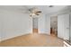 Open dining area featuring neutral tile flooring, a ceiling fan, and bright natural light at 2398 S Lamont St, Las Vegas, NV 89104