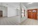 Inviting entryway showcasing tile floors, arched doorway and a double door entrance, offering a welcoming ambiance at 2398 S Lamont St, Las Vegas, NV 89104