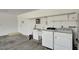 Garage with laundry area, utility sink, and plenty of storage for household needs at 2398 S Lamont St, Las Vegas, NV 89104