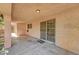 Covered patio offers outdoor space, leading to a sliding glass door for indoor-outdoor living at 2398 S Lamont St, Las Vegas, NV 89104