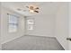 Spacious bedroom with neutral paint and carpet, offering ample natural light at 2486 Dragon Fire Ln, Henderson, NV 89052
