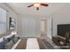 Comfortable bedroom featuring a bed, ceiling fan, and closet at 2486 Dragon Fire Ln, Henderson, NV 89052
