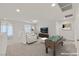 Bright, open-concept living room featuring modern design and a game table at 2486 Dragon Fire Ln, Henderson, NV 89052
