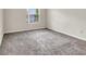 Carpeted bedroom with natural light, perfect for relaxation and rest at 2606 S Durango Dr # 277, Las Vegas, NV 89117