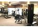 State-of-the-art fitness center with mirrored walls, treadmills, elliptical, and weight training equipment at 2606 S Durango Dr # 277, Las Vegas, NV 89117