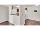 Bright kitchen with wood-look flooring and breakfast bar in a clean, modern design at 2606 S Durango Dr # 277, Las Vegas, NV 89117