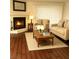 Comfortable living room featuring a fireplace, plush seating, and a warm ambiance at 2606 S Durango Dr # 277, Las Vegas, NV 89117