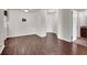 Large open living space with wood floors provides clear view to kitchen and bathroom at 2606 S Durango Dr # 277, Las Vegas, NV 89117