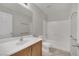 Bathroom featuring single sink vanity, toilet, and shower-tub combination at 2749 Invermark St, Henderson, NV 89044