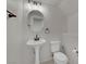 Modern bathroom featuring pedestal sink, updated fixtures, and a sleek design at 2749 Invermark St, Henderson, NV 89044