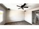 This bedroom features a ceiling fan with lights and a window for natural light at 2749 Invermark St, Henderson, NV 89044