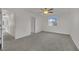 Spacious bedroom with carpet, ceiling fan and good window view at 2749 Invermark St, Henderson, NV 89044