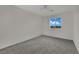 Bright bedroom with carpet, and large window with mountain view at 2749 Invermark St, Henderson, NV 89044