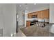 Kitchen featuring stainless steel appliances, granite countertops, and bright lighting at 2749 Invermark St, Henderson, NV 89044